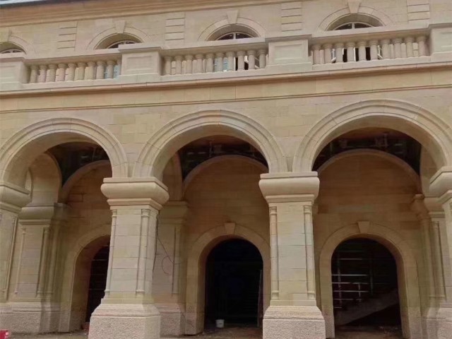 beige sandstone wall and column